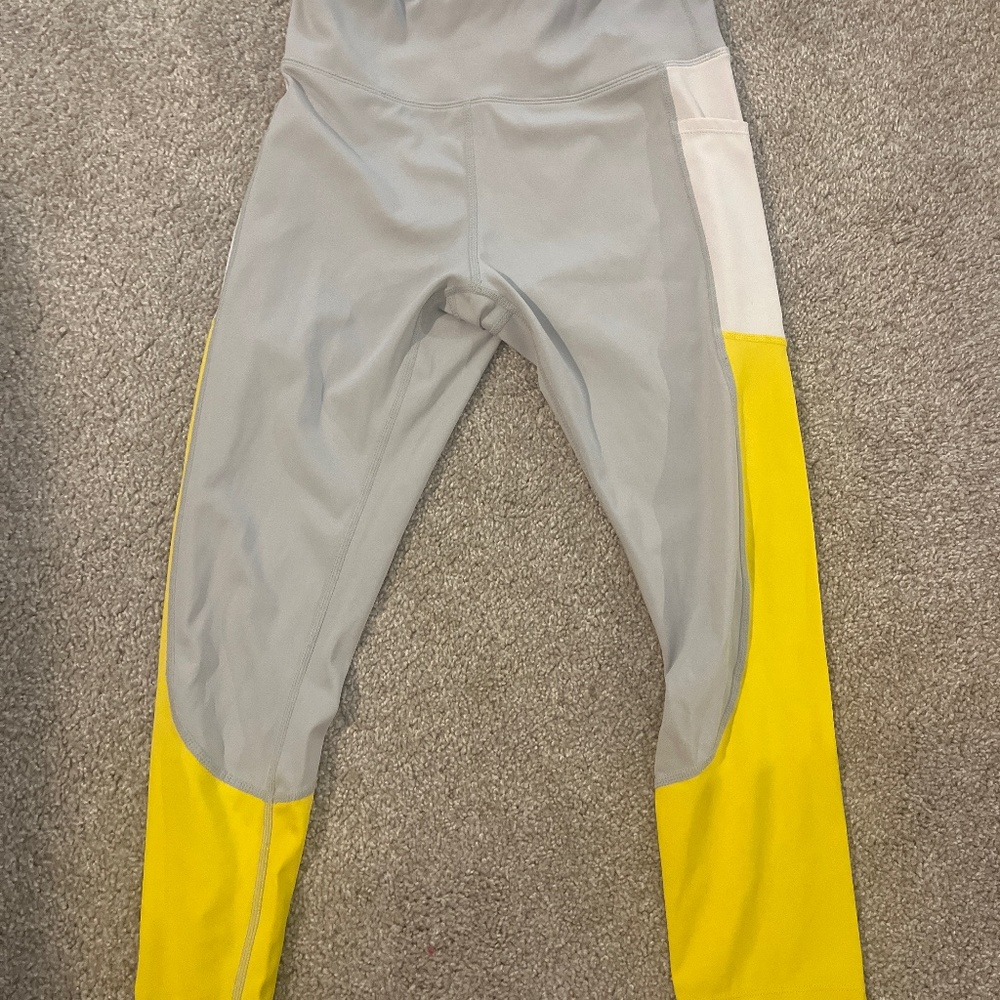 Yellow and gray nylon and spandex capri leggings